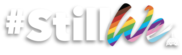 #StillWe logo. On a transparent background, #Still in white block lettering; the We in the progressive Pride colors in stripes diagonally from top left starting with black, brown, red, orange, yellow, green, blue, purple, pink, white, baby blue, all in a serif font; in lower right corner, the Capital Pride Alliance Dome logo mark in white.